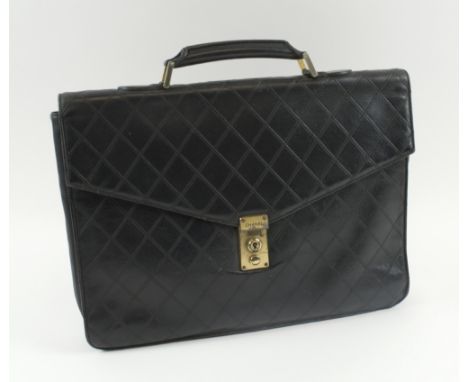 CHANEL VINTAGE BRIEFCASE, black leather quilted pattern, lock and key, gold tone hardware, inside sticker, 37,5cm x 28cm H x 