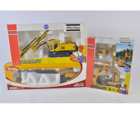 Joal 1:50 scale Atlas Copco Drill, Haulotte Boom Lift and Grove Man Lift. NM-M in E Boxes. (3)