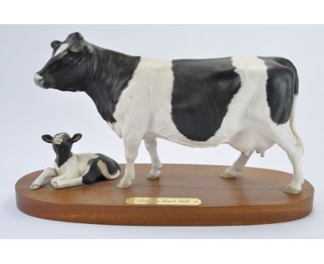 Royal Doulton Beswick Model No. A2607/26909 Freisian Cow and Calf on wooden plinth. Satin Matt Finish. 6.5". (NM-M)