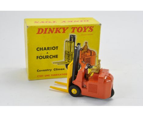 French Dinky No. 597 Chariot A Fourche (Coventry Climax). Orange / yellow including convex hubs, black mast, light tan figure