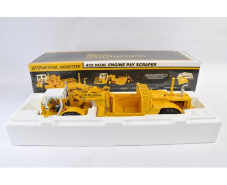 First Gear 1:25 scale International Harvester 433 Pay Scraper. NM-M in E Box.