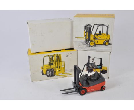 Group of 1:25 scale Fork Lift Trucks from Conrad / NZG. Generally NM in G-VG Boxes. (4)