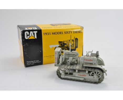 Conrad 1:25 scale CAT 1931 Model Sixty Diesel Tracked Tractor. NM in G Box. 