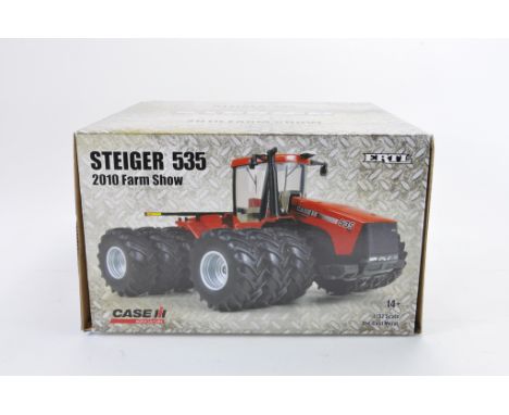 Scarce Ertl 1:32 scale Steiger 535 2010 Farm Show Tractor (RED CHROME EDITION). NM-M in E Box.