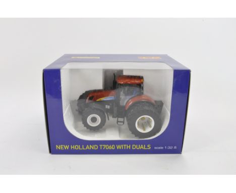 ROS 1:32 scale New Holland T7060 with Duals (Special Terracotta Edition). NM-M in E Box.