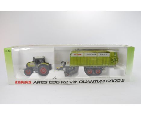 Universal Hobbies 1:32 scale Claas Ares 836 and Quantum 6800 Forage Trailer Set. NM-M in VG Box.