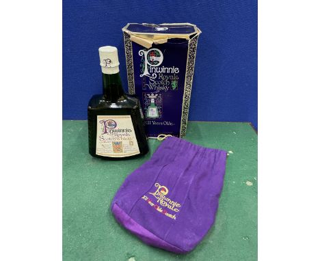 A BOTTLE OF PINWINNIE ROYAL SCOTCH WHISKY XII YEARS OLD  CIRCA 1970'S BOTTLED BY HAND IN SCOTLAND 1.75LITRES IN A ROCKING BOT