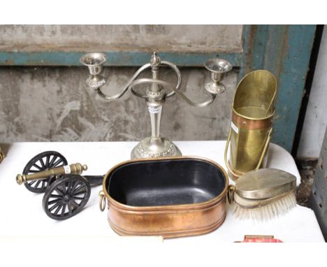 A SMALL COPPER PLANTER, SMALL BRASS AND COPPER COAL SCUTTLE, BRASS AND CAST CANON, BRUSH AND CANDLEABRA