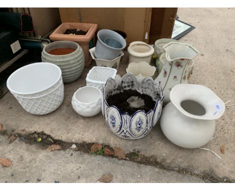 AN ASSORTMENT OF VARIOUS CERAMIC PLANT POTS