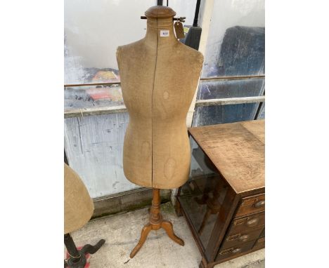 A VINTAGE FRENCH DRESS MAKERS MANNEQUIN WITH WOODEN STAND