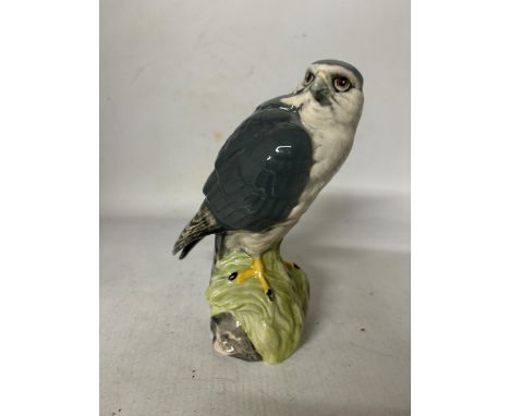 A ROYAL DOULTON MERLIN MODELLED BY JOHN G TONGUE 1979  FILLED AND SEALED WITH BENEAGLES SCOTCH WHISKY