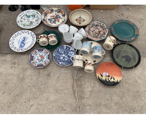 AN ASSORTMENT OF CERAMIC PLATES, BOWLS AND MUGS ETC