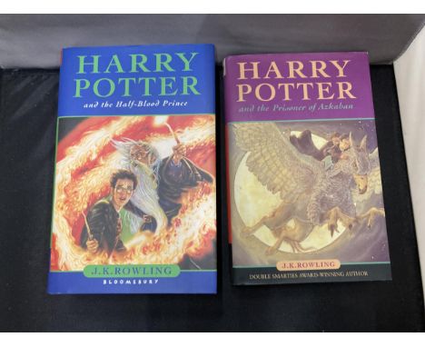 TWO FIRST EDITION HARRY POTTER HARDBACK BOOKS WITH SLEEVES TO INCLUDE HARRY POTTER AND THE HALF BLOOD PRINCE AND HARRY POTTER