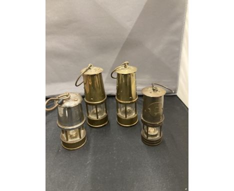 FOUR MINIATURE MINERS LAMPS TO INCLUDE JAS WILBY AND PROTECTOR LAMP ECCLES TALLEST 12CM
