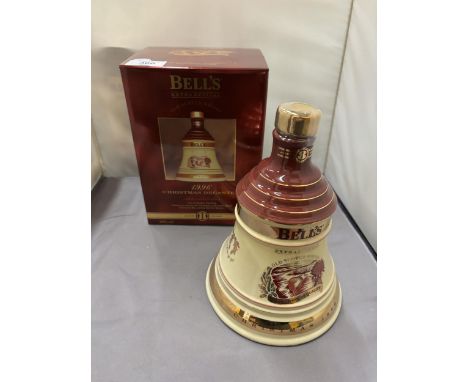 A BOXED AND SEALED BELL'S EXTRA SPECIAL OLD SCOTCH WHISKY CHRISTMAS 1996 IN A PORCELAIN DECANTER FINISHED IN 22 CARAT GOLD