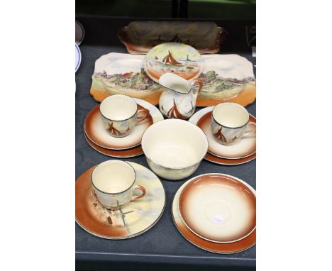 A QUANTITY OF EMPIRE WARE 'STORMY WATERS' TEA WARE TO INCLUDE CAKE PLATES, SANDWICH PLATE, SUGAR BOWL, CREAM JUG, CUPS, SAUCE