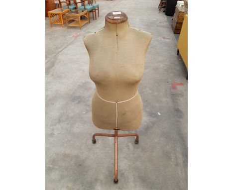 AN ORIGINAL VINTAGE SINGER MANNEQUIN ON TUBULAR FRAME