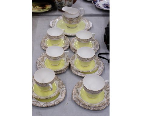 A VINTAGE CHINA TEASET TO INCLUDE A CAKE PLATE, SUGAR BOWL, CREAM JUG, CUPS, SAUCERS AND SIDE PLATES