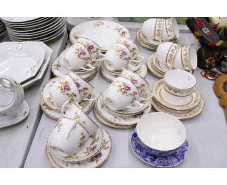 A LARGE QUANTITY OF VINTAGE TEAWARE TO INCLUDE CAKE PLATES, SUGAR BOWLS, CUPS, SAUCERS AND SIDE PLATES