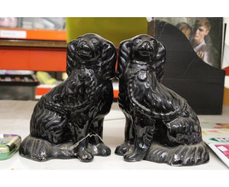 TWO LARGE CERAMIC DOG FIGURINES OF A KING CHARLES SPANIEL