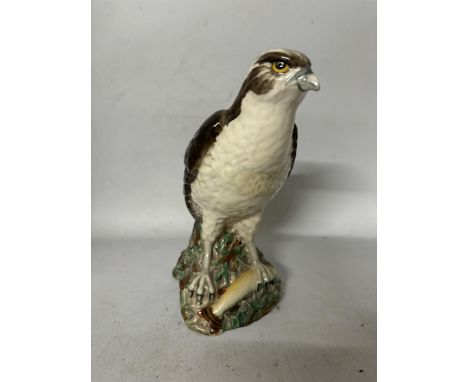 A ROYAL DOULTON OSPREY MODELLED BY D LYTTLETON 1977 FILLED AND SEALED WITH WHYTE AND MACKAY SCOTCH WHISKY