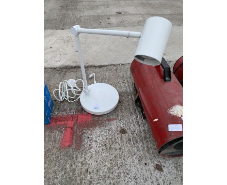 AN ADJUSTABLE TABLE LAMP