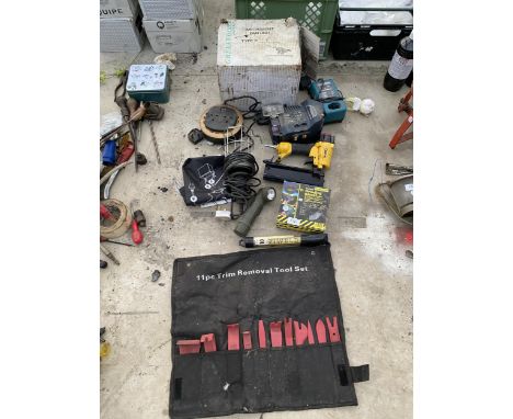 AN ASSORTMENT OF TOOLS TO INCLUDE A SMALL MACALLISTER SHARPENER, AN AIR COMPRESSOR NAIL GUN AND A TRIM REMOVAL SET ETC