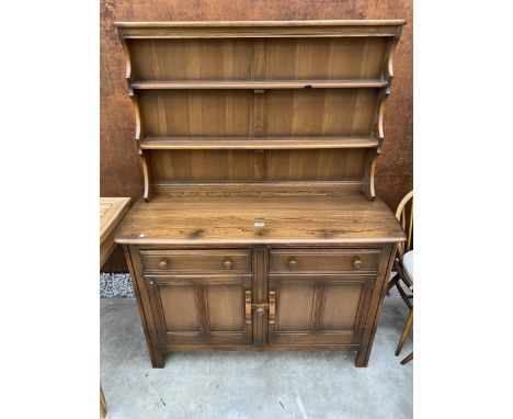 AN ERCOL DRESSER WITH PLATE RACK WITH TWO CUPBOARDS AND TWO DRAWERS TO BASE, 48" WIDE