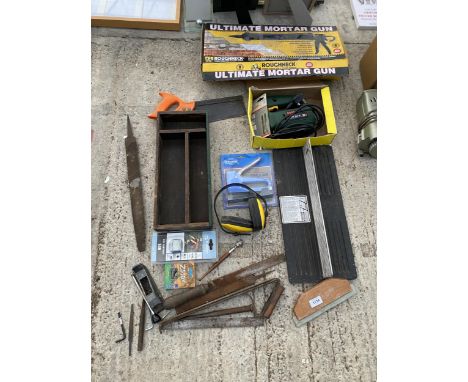AN ASSORTMENT OF TOOLS TO INCLUDE A STAPLE GUN, A BOSCH ELECTRIC JIGSAW AND FILES ETC