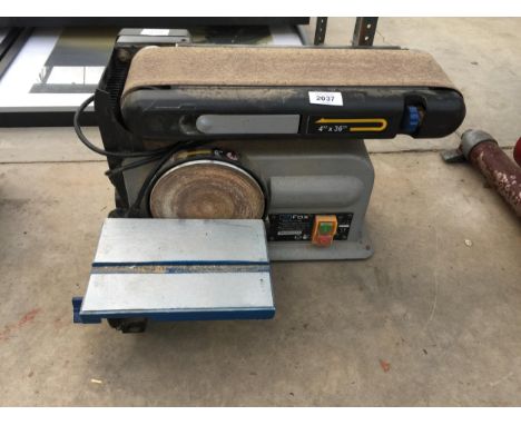 AN ELECTRIC FOX WORK BENCH SANDER