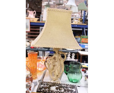 A TABLE LAMP WITH AN ORIENTAL FIGURE TO THE BASE, PLUS SHADE, HEIGHT TO THE TOP OF THE SHADE 60CM
