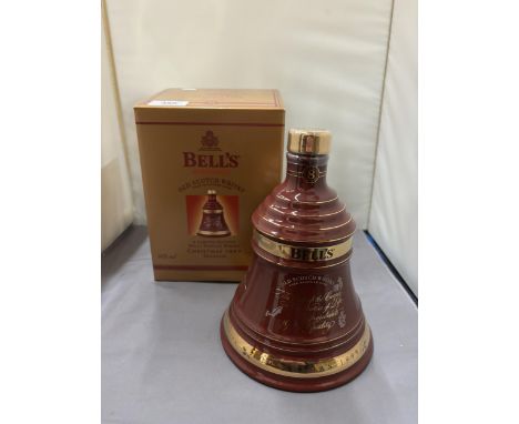 A BOXED AND SEALED BELL'S EXTRA SPECIAL OLD SCOTCH WHISKY BEING A LIMITED EDITION FOR CHRISTMAS 1999 IN A PORCELAIN DECANTER