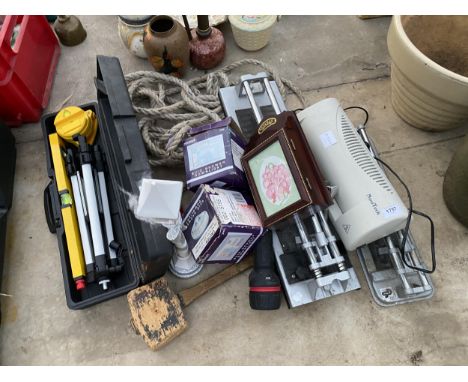 AN ASSORTMENT OF ITEMS TO INCLUDE A LAZER LEVEL, A KEY BOX AND A TILE CUTTER ETC