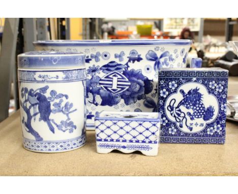 FOUR BLUE AND WHITE ORIENTAL CERAMIC ITEMS TO INCLUDE A LARGE PLANTER, STORAGE JAR, POT POURRI POT, ETC