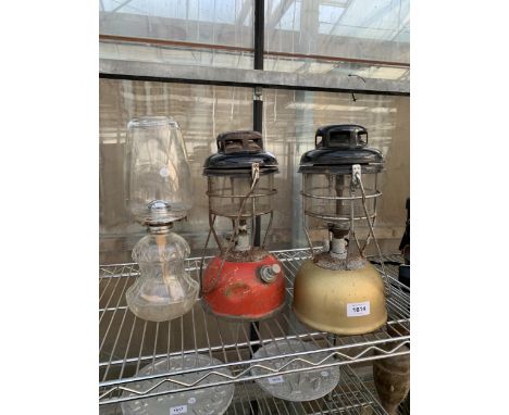 TWO VINTAGE TILLEY LAMPS AND A FURTHER OIL LAMP