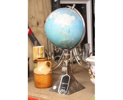 A GLOBE ON A METAL STAND, HEIGHT APPROX 43CM