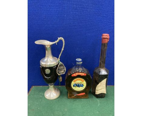 A BOTTLE OF R. JELINEK GOLD PLUM BRANDY TOGETHER WITH LACRIMA CRISTI VINO LIQUEUR AND A CREME DE FRAMBOISE AU COGNAC LIQUEUR