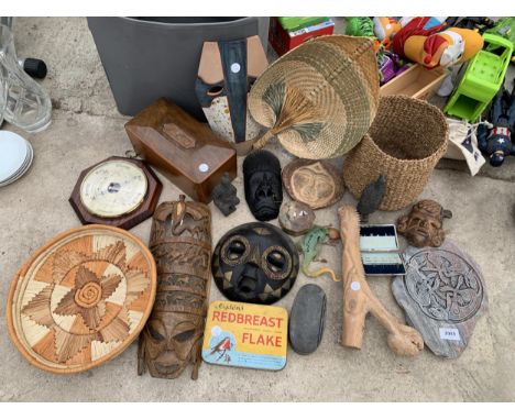 AN ASSORTMENT OF ITEMS TO INCLUDE A BAROMETER, TREEN FACE MASKS AND WICKER WARE ETC
