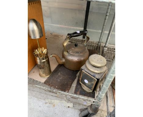 A VINTAGE COPPER KETTLE, A CIGARETTE HOLDER AND A PARAFIN LANTERN