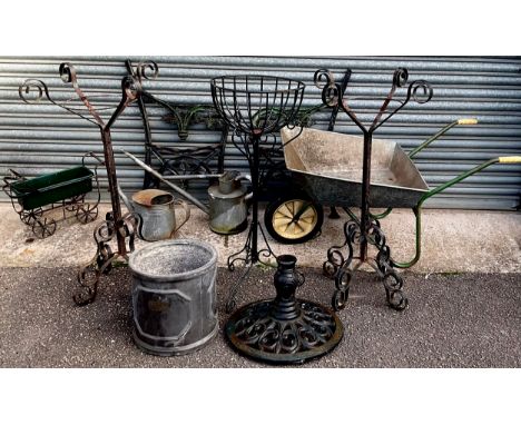 Garden Items - wheel barrel;  wirework plant stands;  plant pots, bench ends, watering cans;  etc**Please note that some of t