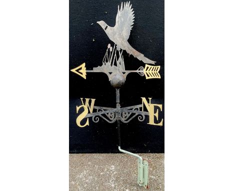 A painted steel weather vane, the silhouette cresting as a pheasant, 56.5cm diam**Please note that some of the lots in this a