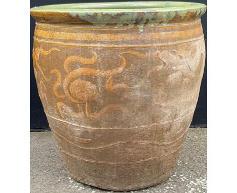 A garden planter, decorated with a dragon in mustard, on a tan ground**Please note that some of the lots in this auction are 