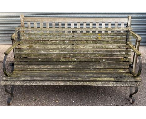 A garden bench, slatted back and seat**Please note that some of the lots in this auction are held offsite and others may requ