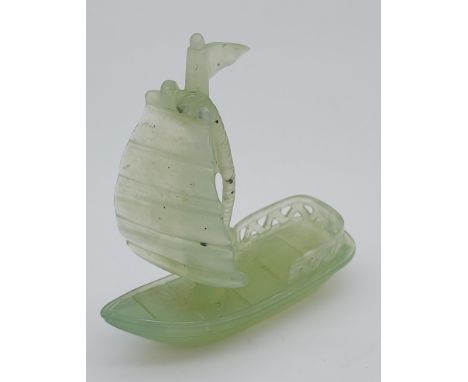 A Chinese hand carved jade junk boat sculpture.