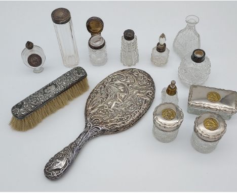 A Selection of Silver and plated dressing table bottles and hand mirror etc 