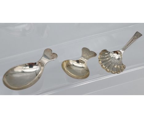 A Lot of three Georgian silver caddy spoons. [8cm in length] [26.85grams] 