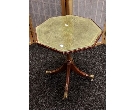 Antique lamp table, hexagonal top with green leather surface beneath glass, supported on a turned column with four outswept l