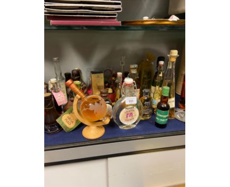 A Collection of miniature liquors to include Grappa Treber, Highland malt whisky in the shape of a globe, Danzy Jones and man