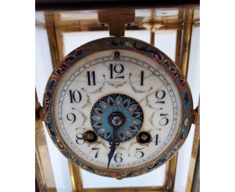 Antique 19th century brass, bevel glass and cloisonné mantel clock. Comes with a cloisonne and mercury pendulum. Key included