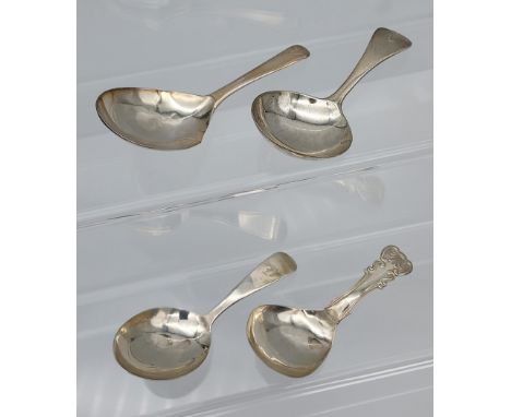 A Lot of four Georgian silver caddy spoons. [46.18grams] 